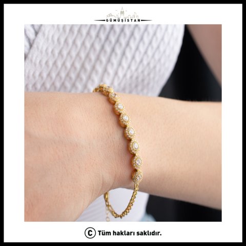 Beyaz Zirkon Taşlı Oval Bileklik – 925 Ayar Gümüş Gold Kaplama Zarif Bileklik
