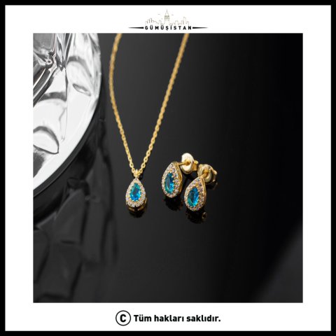 Aralık Ayı Doğum Taşı Takı Seti – 925 Ayar Gümüş Mavi Topaz Rengi Kolye ve Küpe